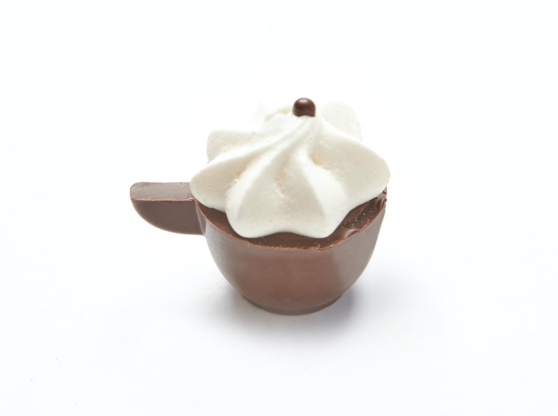 TRES LECHES
Tres Leches in creamy milk chocolate topped with a meringue. Dark shell. Gluten-free