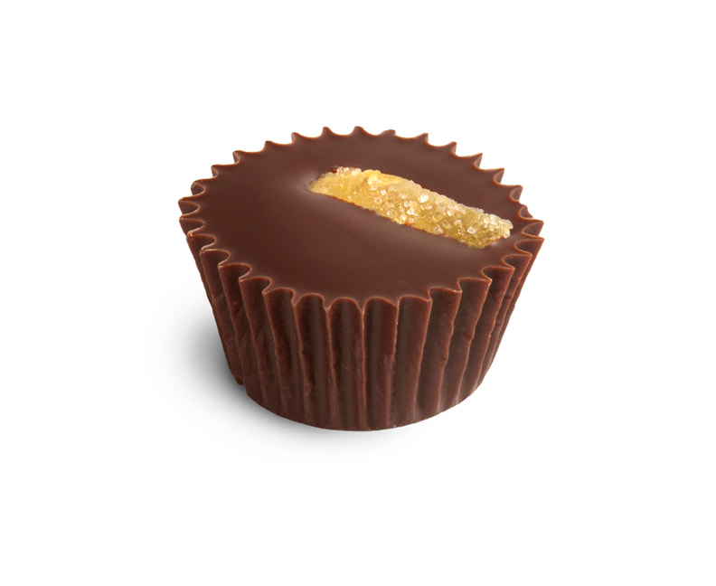 CANDIED GINGER CUP
Solid dark chocolate and a hot, sweet candied ginger. Vegan. Gluten-free
